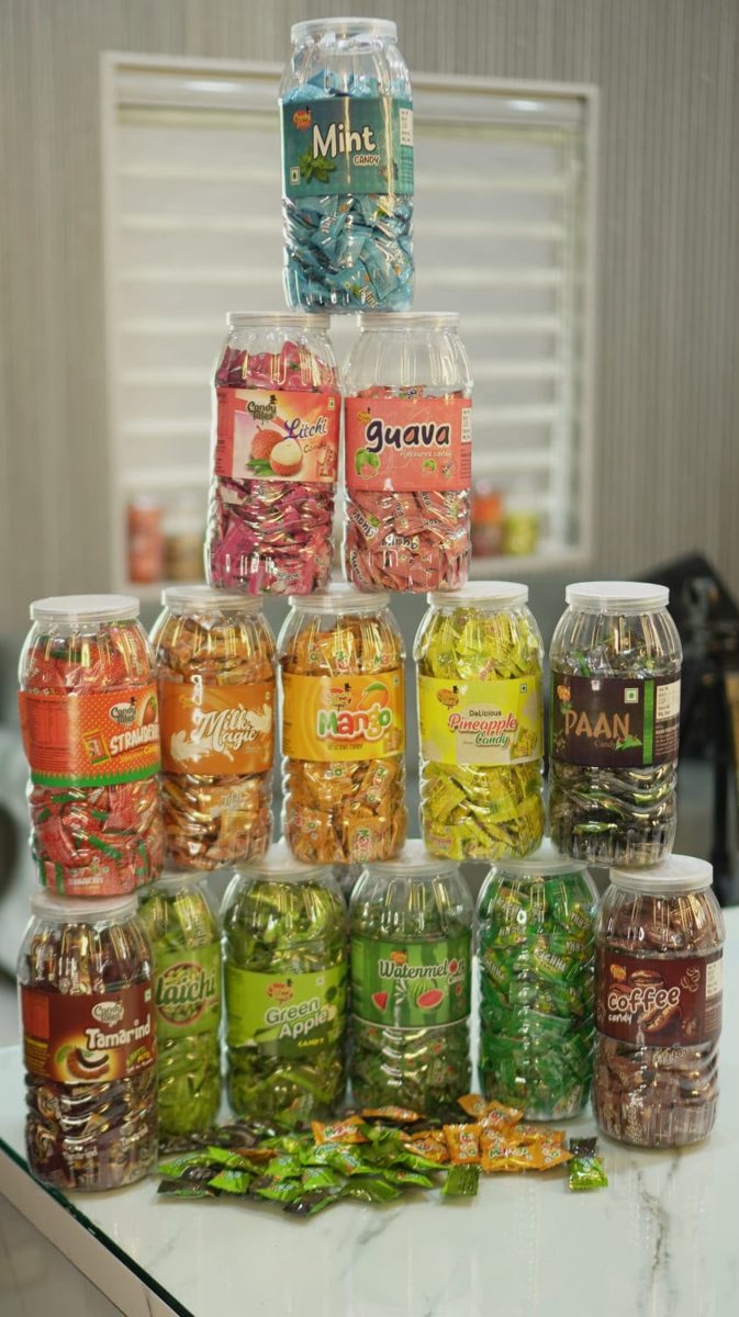 A pyramid of Candy Tales jars — mint, litchi, guava, mango, paan and more